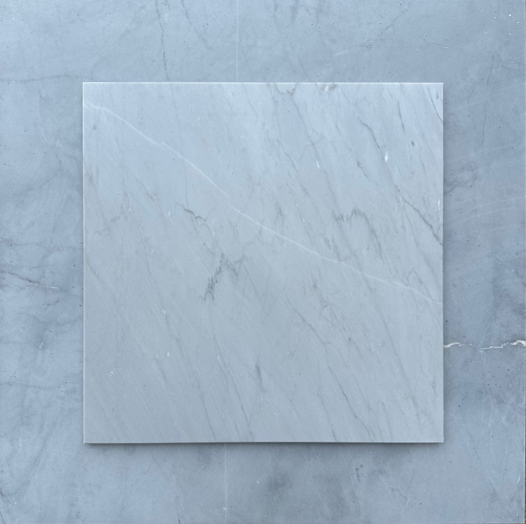 Italian Bardiglio Imperiale marble tile with dark grey tones and distinct white veining.