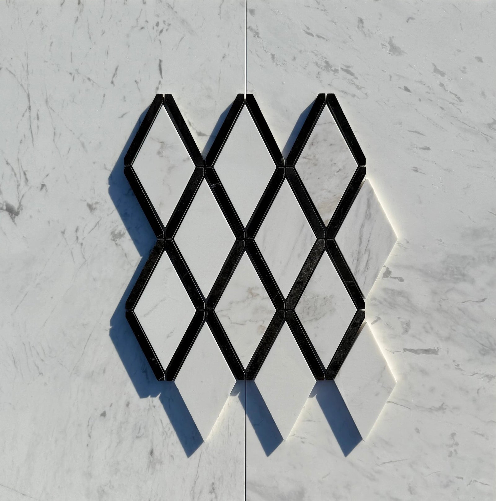 Diamond mosaic tile: Carrara white marble with Nero Marquina black border by Tilehouz, 2x4 wall tile