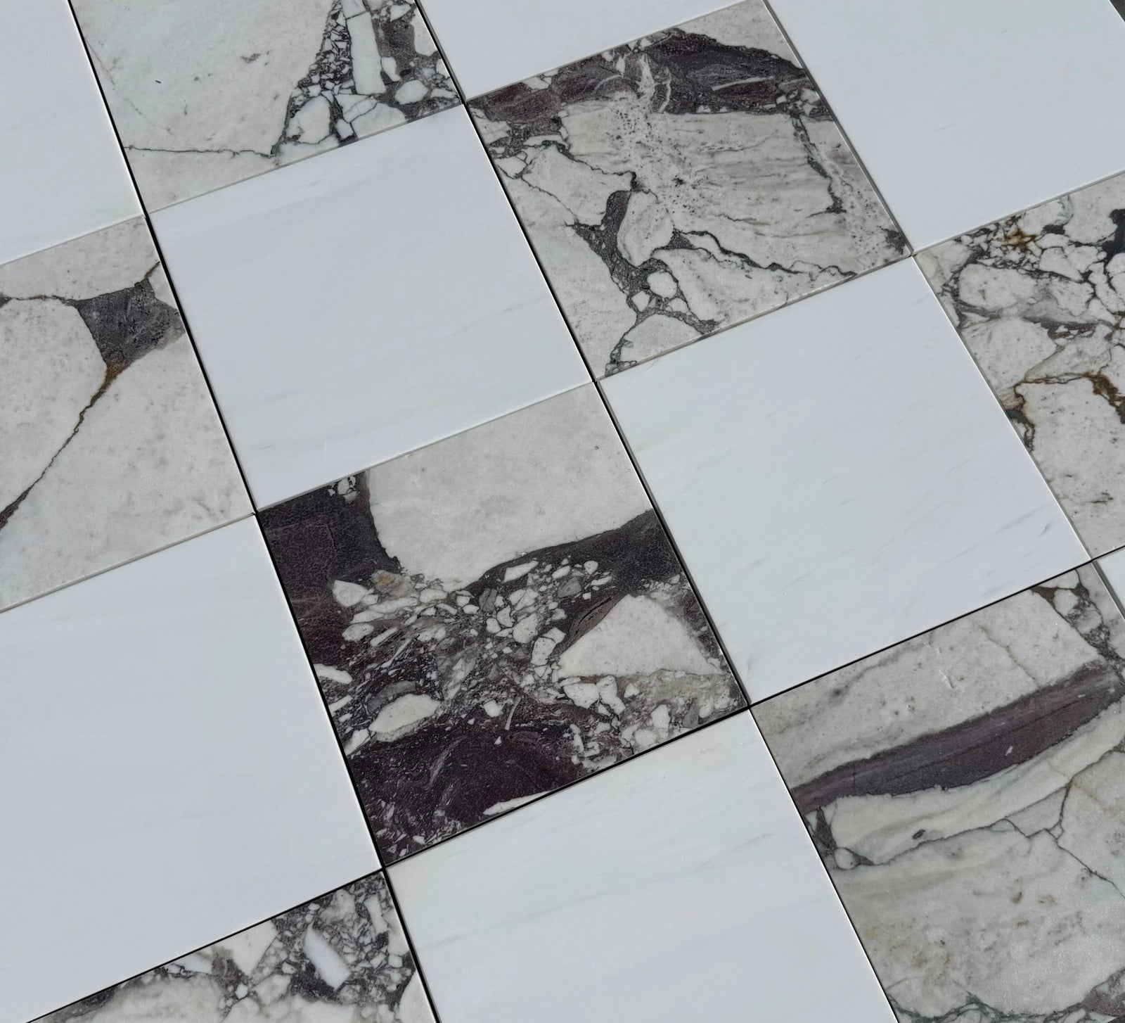 Checkerboard marble tile by Tilehouz, Calacatta Viola & Bianco Dolomite, wall & ceiling tile in white and dark veining.