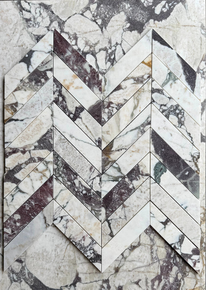 Calacatta Viola Marble 2x8 Chevron Mosaic tile by Tilehouz, wall tile with white and purple veining