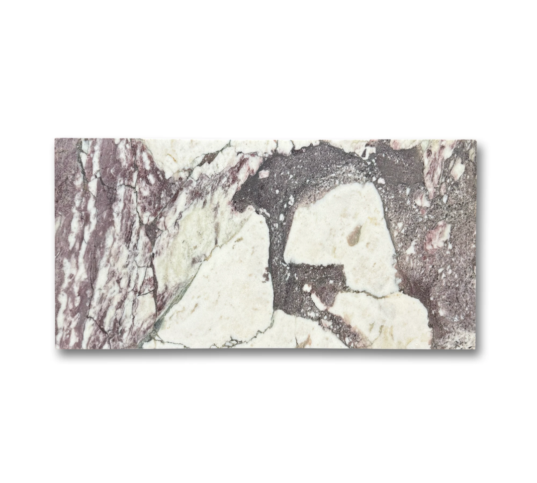 Calacatta Viola marble tile 12x24; a wall &amp; ceiling tile with white base and purple veins.