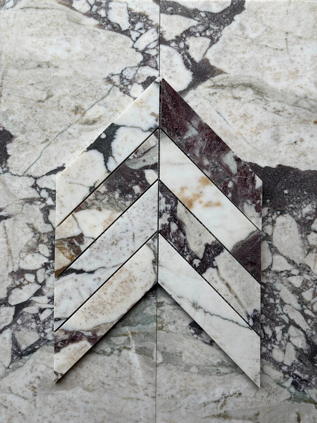 Calacatta Viola marble 2x8 chevron mosaic wall tiles by Tilehouz