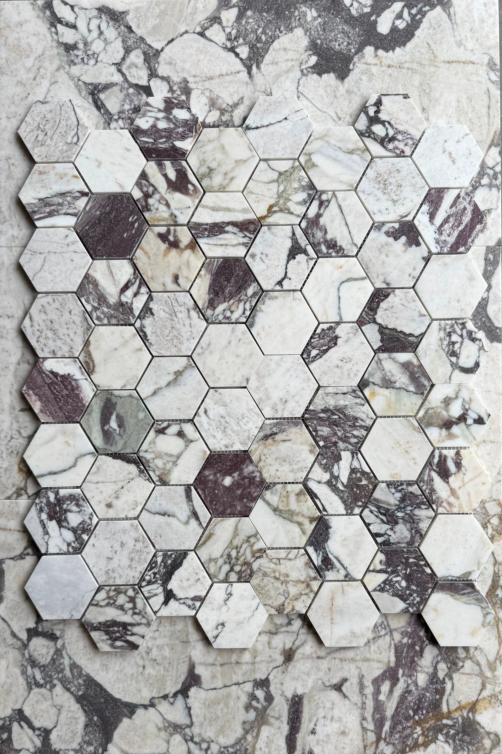 Calacatta Viola marble 3-inch hexagon mosaic sheet by Tilehouz, white with purple veining