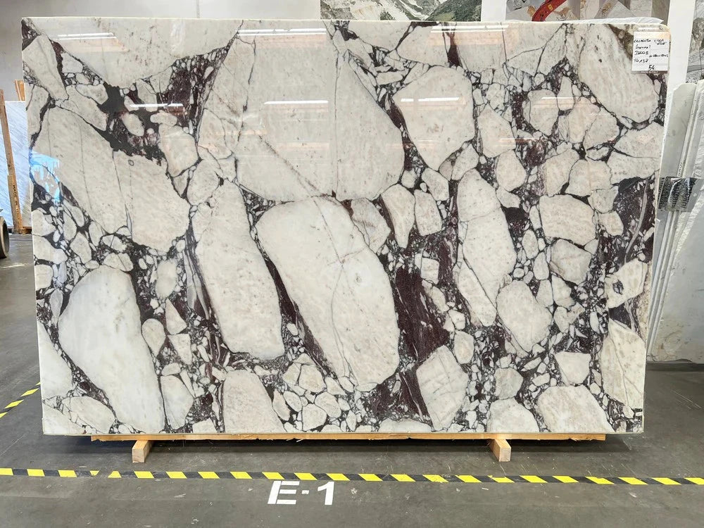 Marble Calacatta Viola WOW polished slab countertop by Tilehouz, white with bold dark veining.
