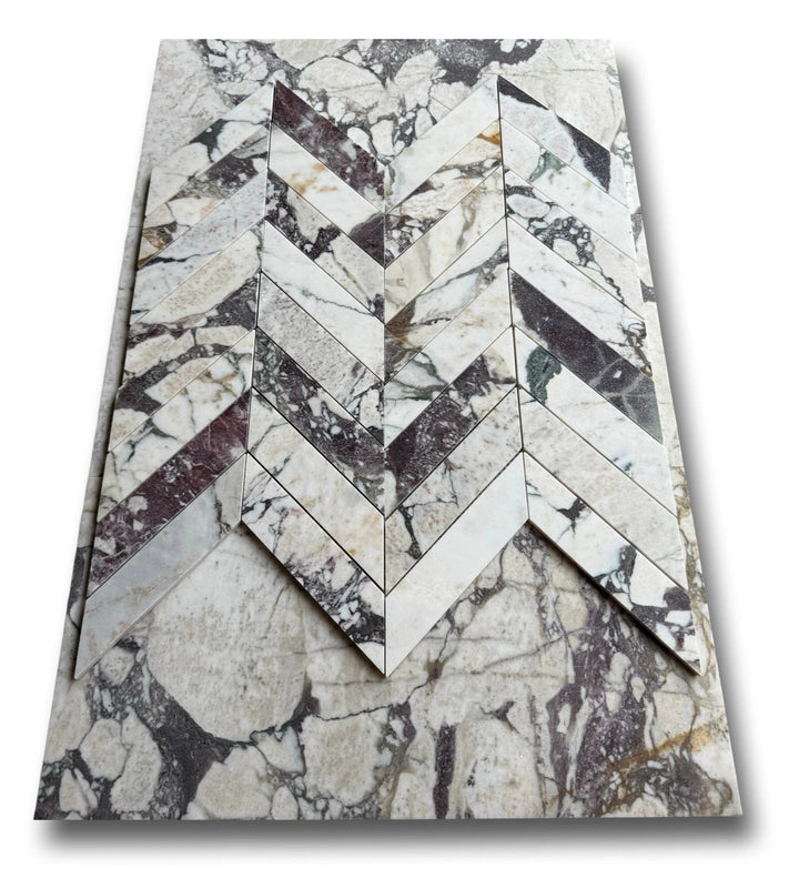 Calacatta Viola marble 2x8 chevron mosaic tile by Tilehouz; white with violet veining; set of 4 sheets.