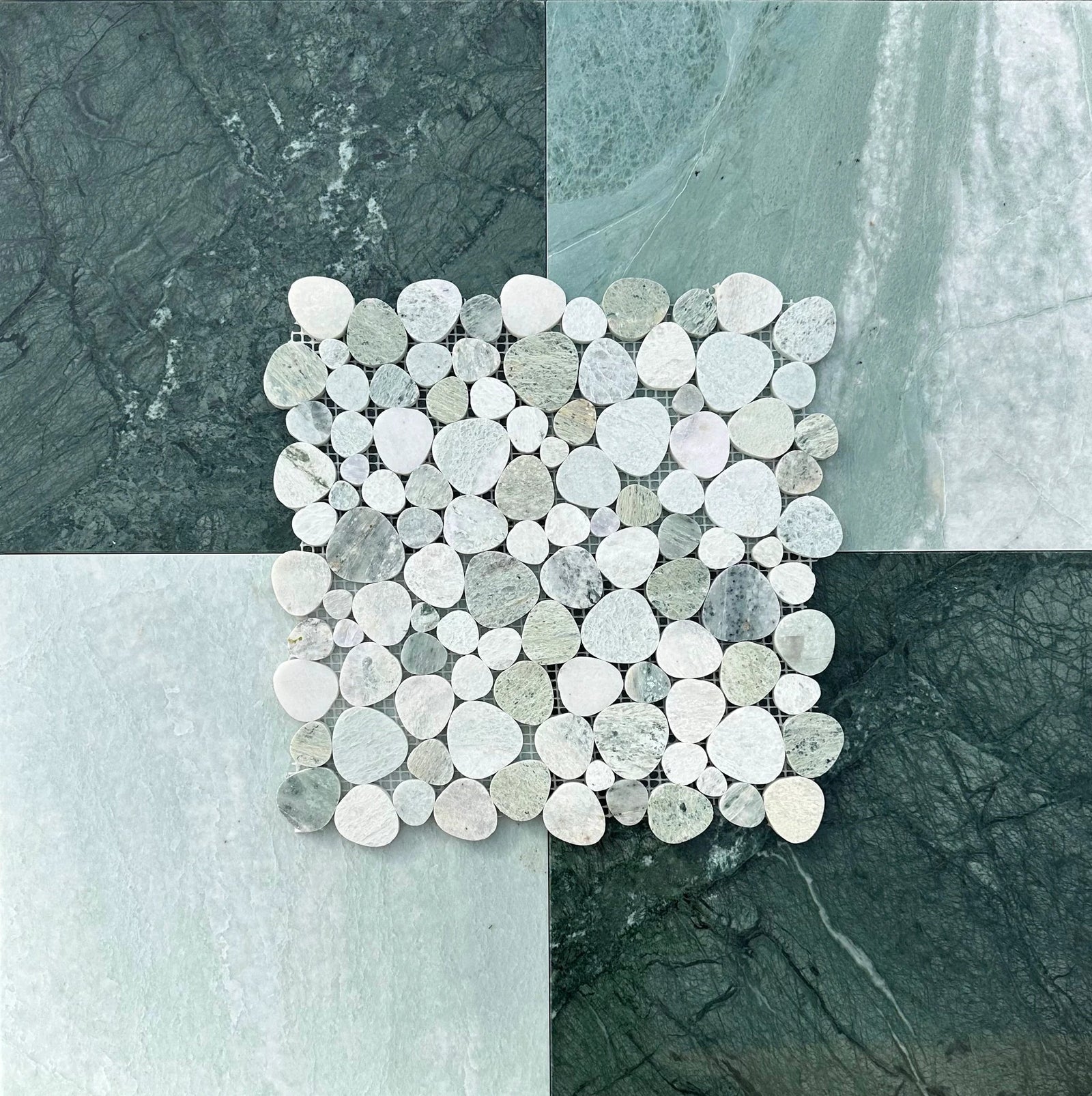 Ming Green Marble Aphrodite Mosaic; round marble discs in greens and whites on a large green-gray tile backdrop.
