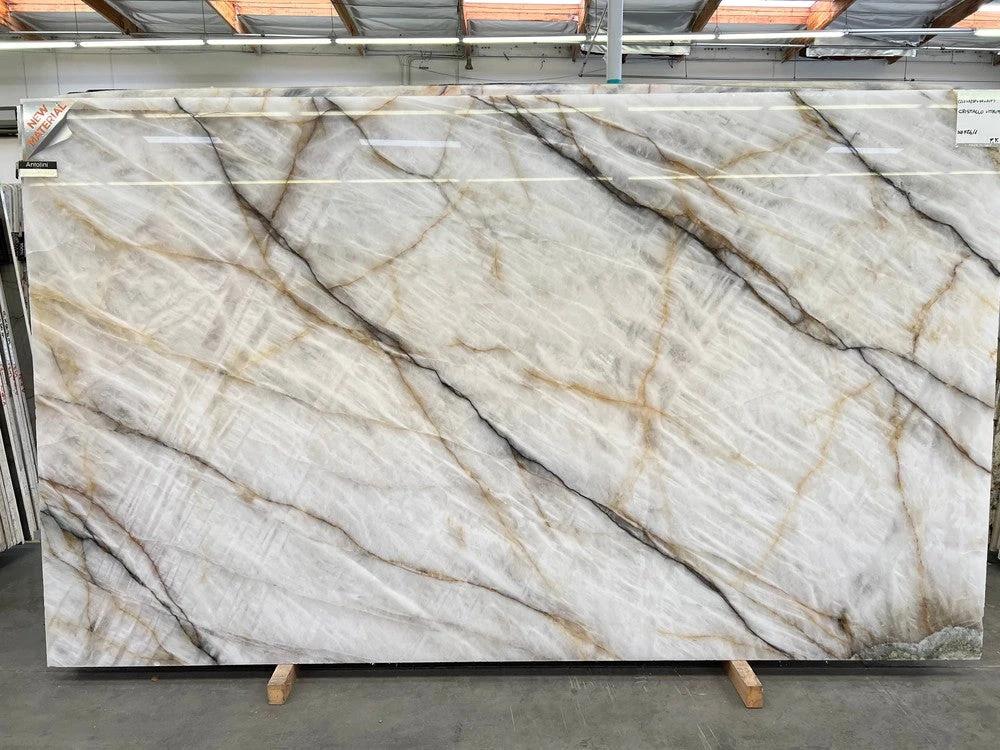 Cristallo Vitrum slab by Tilehouz, polished white countertop with gray, black and gold veining, 126 x 75.