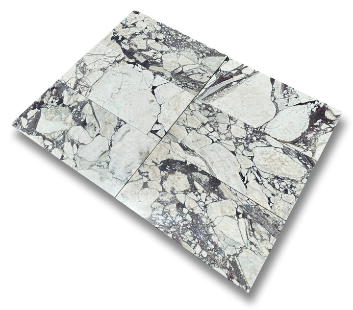 Calacatta Viola marble tile 12x24 by Tilehouz; white with gray-purple veining for wall &amp; ceiling.