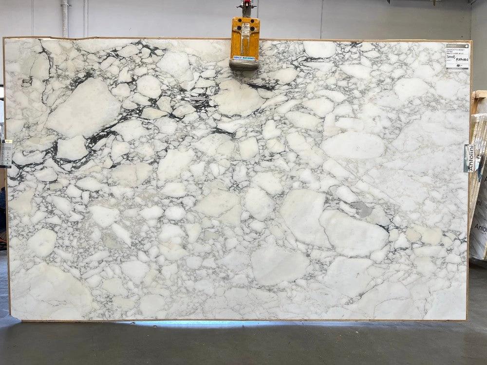 Marble slab Calacatta Monet, extra honed finish; white with gray veining; 129 x 77 countertop slab by Tilehouz