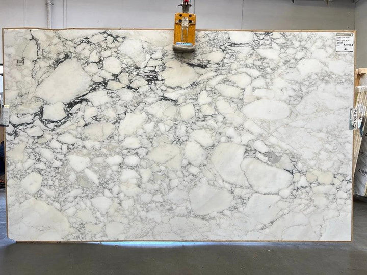 Marble slab Calacatta Monet, extra honed finish; white with gray veining; 129 x 77 countertop slab by Tilehouz