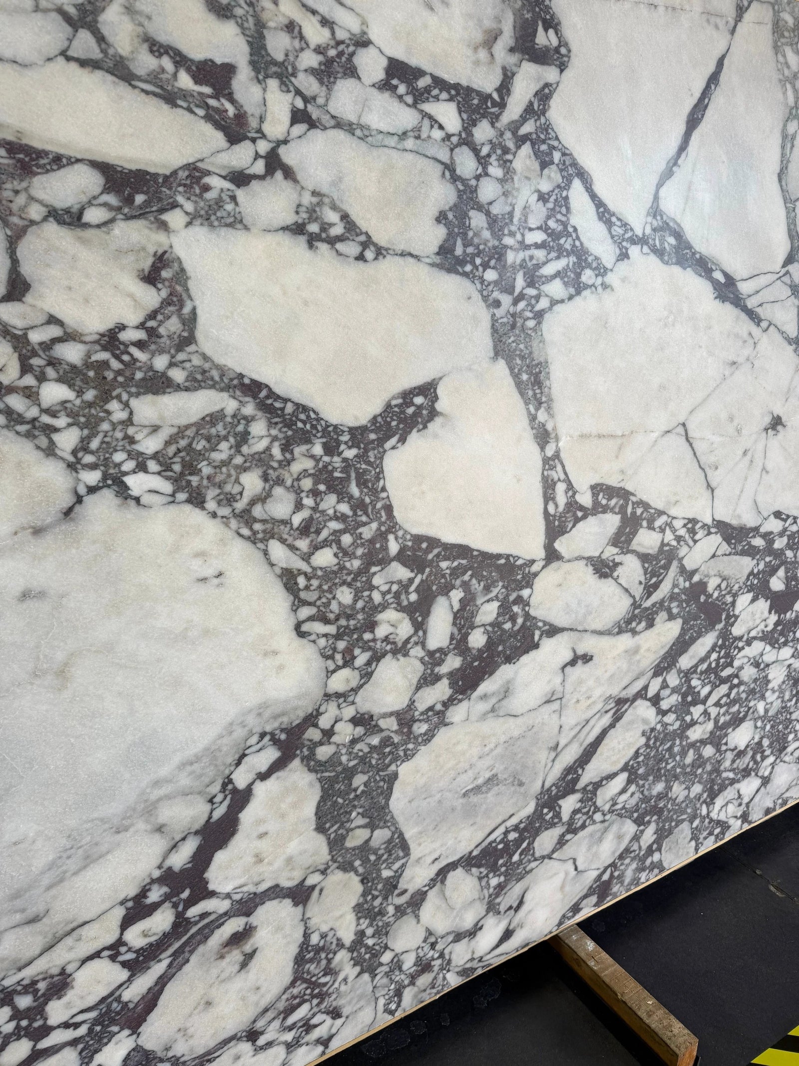 Calacatta Viola marble slab for countertops, honed finish, white with dark gray veining