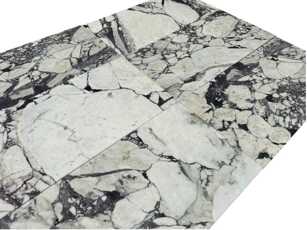 Calacatta Viola marble tile, 12x24, white with bold gray-veining; wall &amp; ceiling tile, 4 tiles shown.