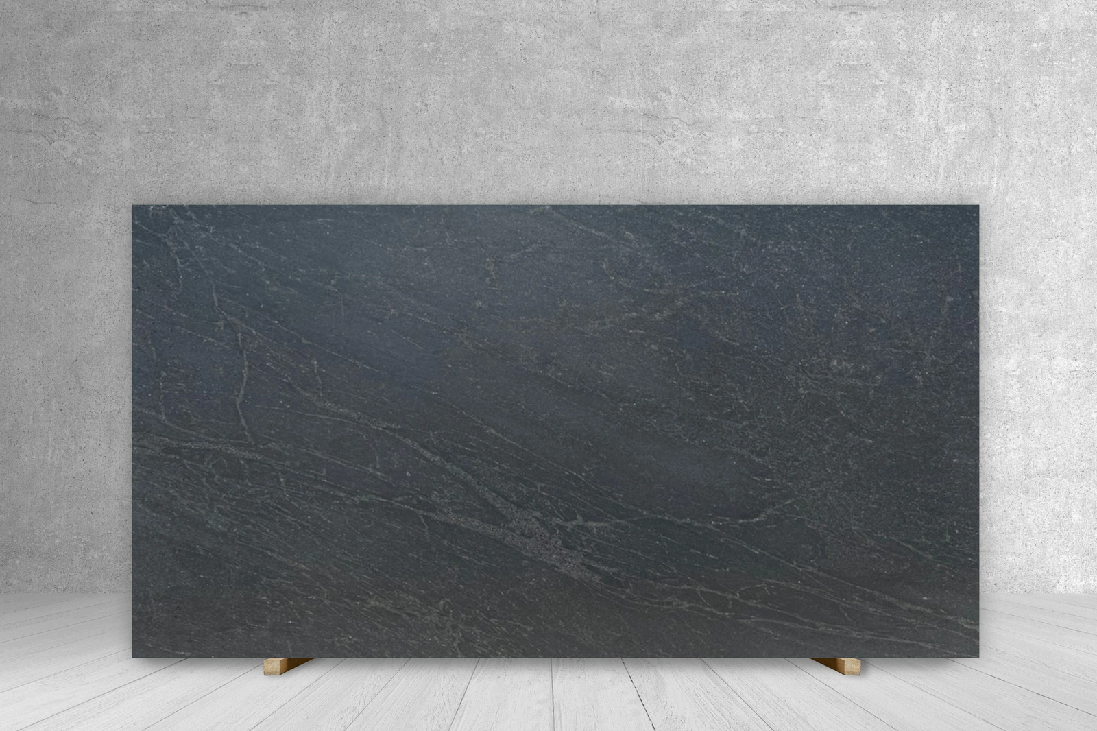 Granite slab Nero AB honed; dark gray with subtle veining, 121 x 75 cm countertop by Tilehouz.