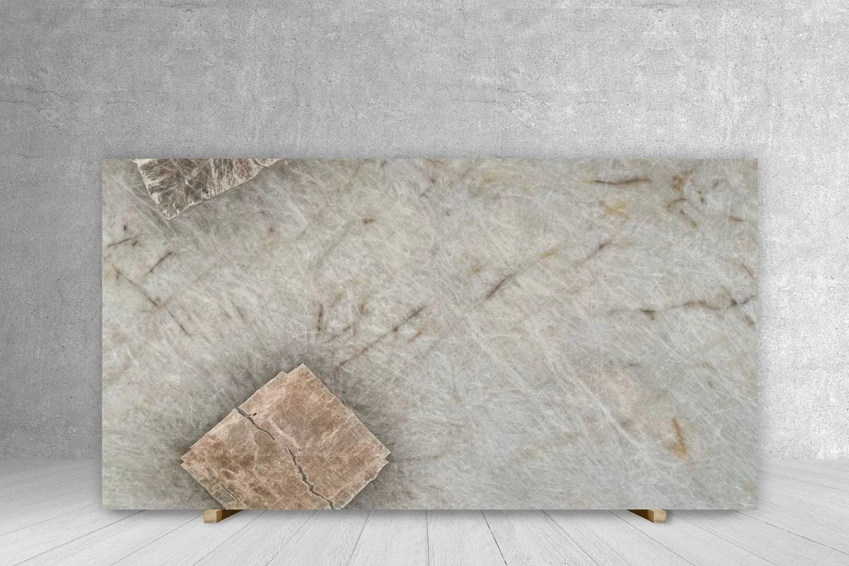 Quartzite Patagonia Glace polished slab, 129 x 72, light gray with beige veining; small sample tile on front left.