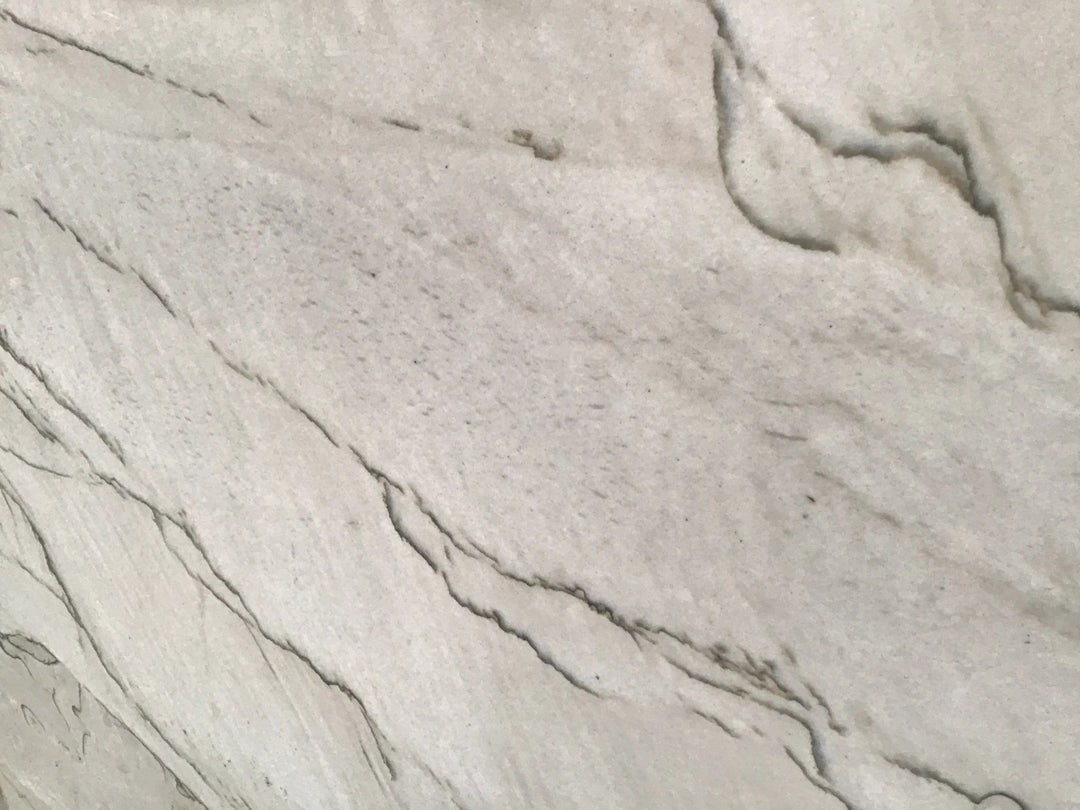 Quartzite slab Tilehouz Kalahari Fenice White Duna polished countertop with light gray veining