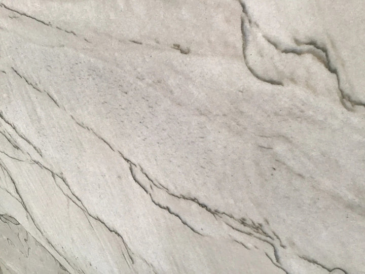 Quartzite slab Tilehouz Kalahari Fenice White Duna polished countertop with light gray veining