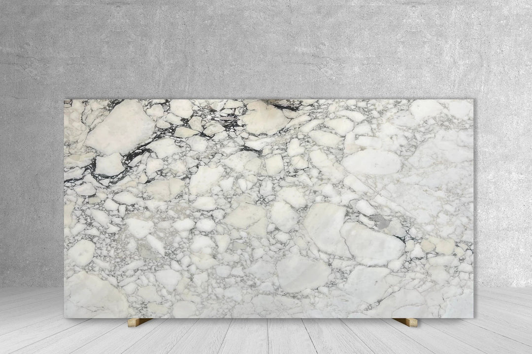 Marble slab Calacatta Monet, extra-honed finish, white with gray veining; Tilehouz countertop slab 129x77.