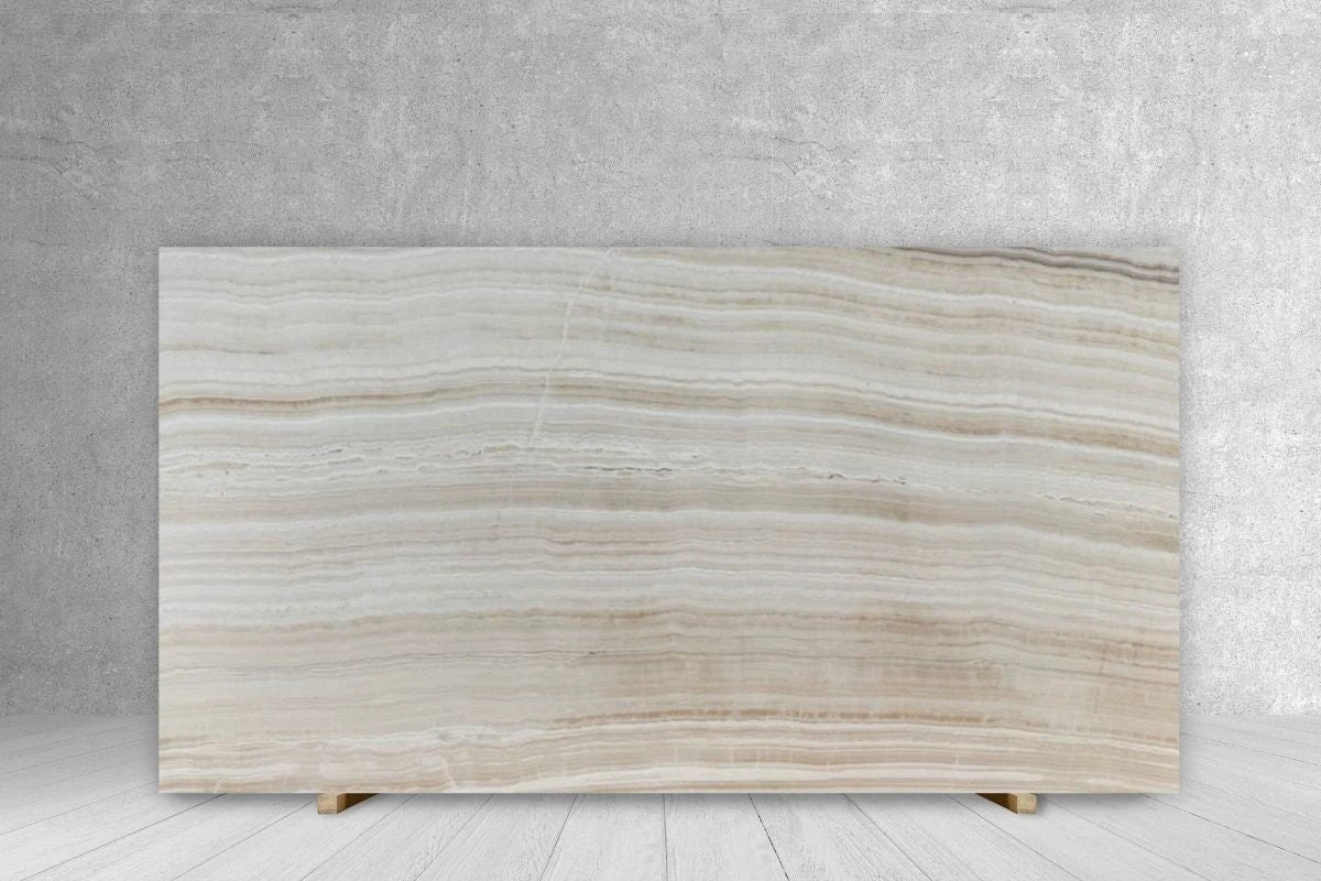 ONYX Ivory WOW slab, vanilla-veined ivory with a polished countertop finish.