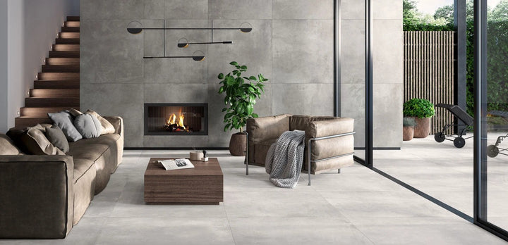 Volcano White porcelain tile, 24x48; light gray wall and floor tiles in a modern living room.