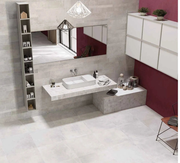 Volcano White porcelain tile 24x48 by Tilehouz, used on bathroom walls and floor.