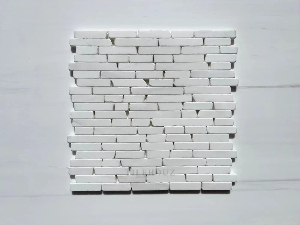 Bianco Dolomite Manhattan random strip tumbled marble mosaic by Tilehouz for wall tiles
