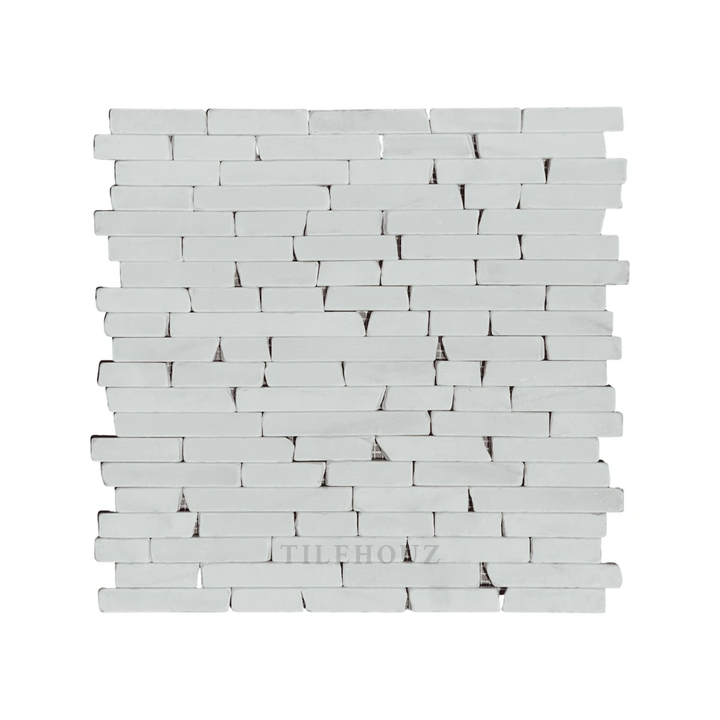 Marble Bianco Dolomite Manhattan random-strip tumbled mosaic tile by Tilehouz for walls