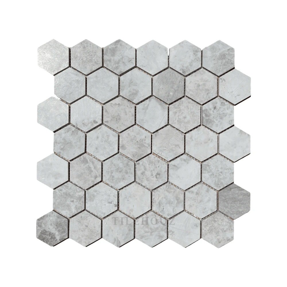 Bianco Gris Dolomite 2-inch hexagon marble mosaic with leathered finish in icy white tones by Tilehouz