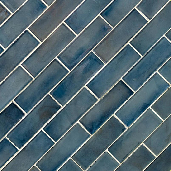 Blue Storm 2x6 Glass Subway Tile; pearl-blue glass wall tile in a diagonal brick pattern