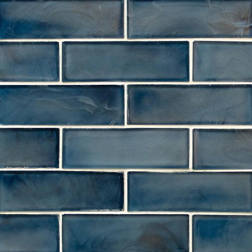Blue Storm 2x6 glass subway tile with a pearl-like blue finish for walls and backsplashes.