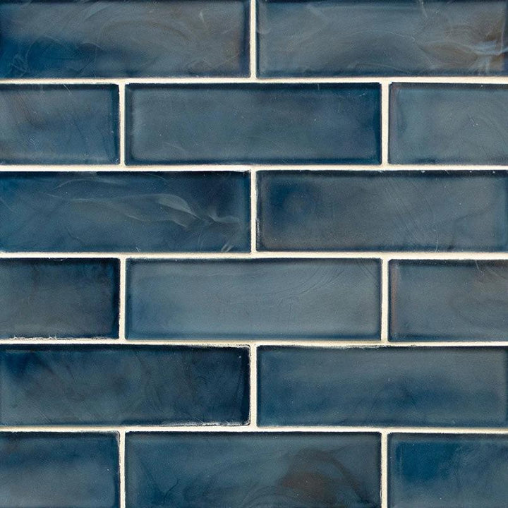 Blue Storm 2x6 glass subway tile with a pearl-like blue finish for walls and backsplashes.