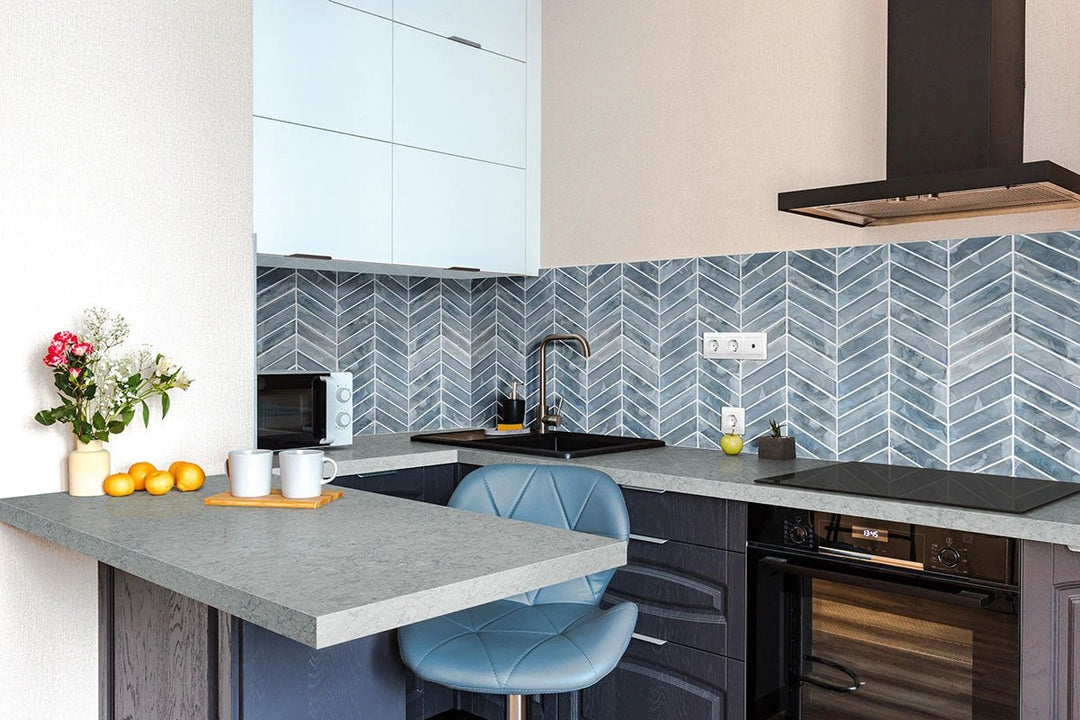 Blue Storm Glass Chevron Mosaic backsplash tile; blue glass chevron pattern for walls