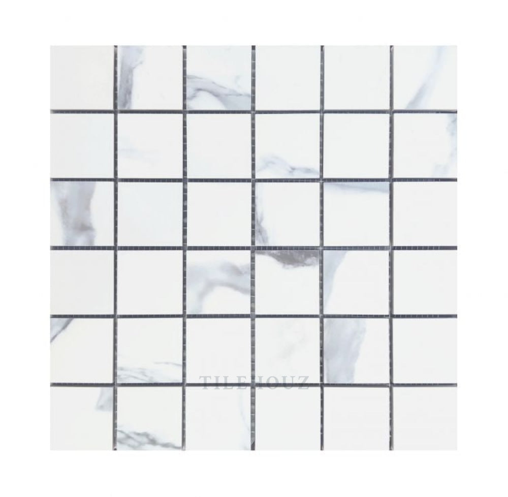 Calacatta Blue Matte 2x2 porcelain tile mosaic by Tilehouz, white with blue marble veining on a 12x12 sheet
