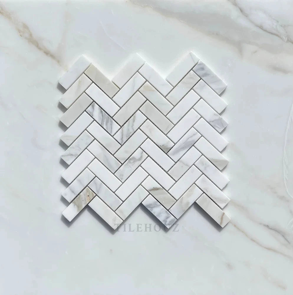 Calacatta Gold marble 1x3 herringbone mosaic tile sheet, polished and honed finish, TileHouz wall tile