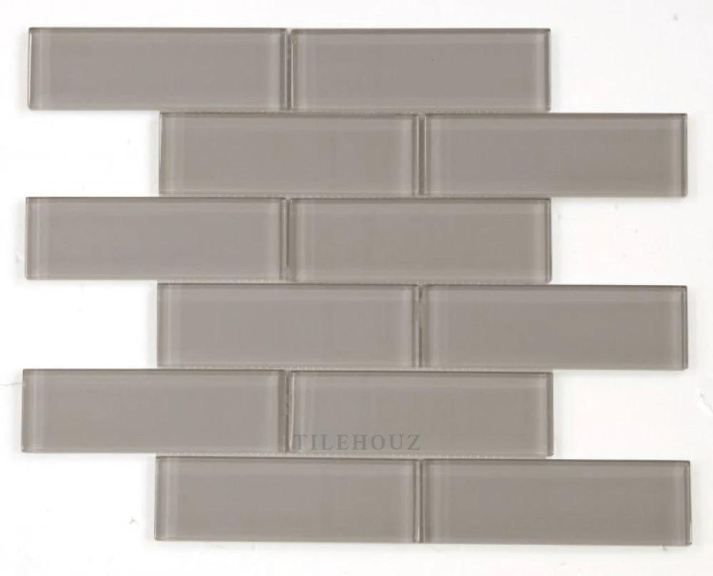 Casale Grey Shining glass mosaic tile by Tilehouz, 11.75 x 11.75 in, polished grey subway brick pattern