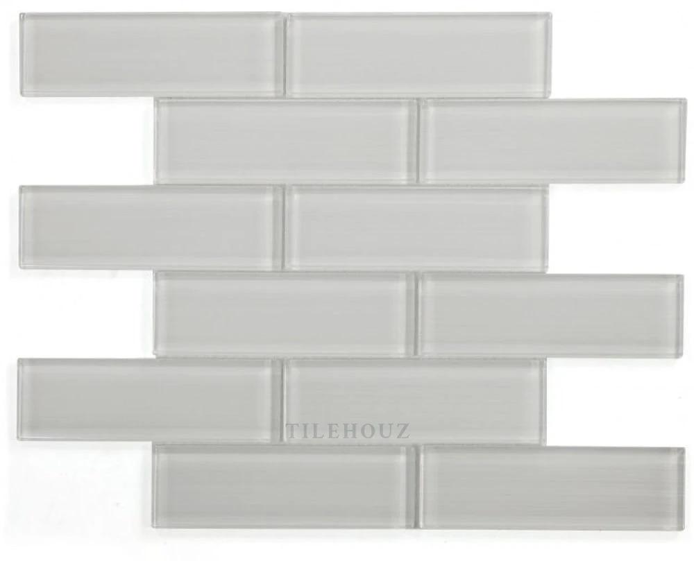 Casale Light glass mosaic wall tile by Tilehouz, 11.75 x 11.75 in, light gray brick pattern