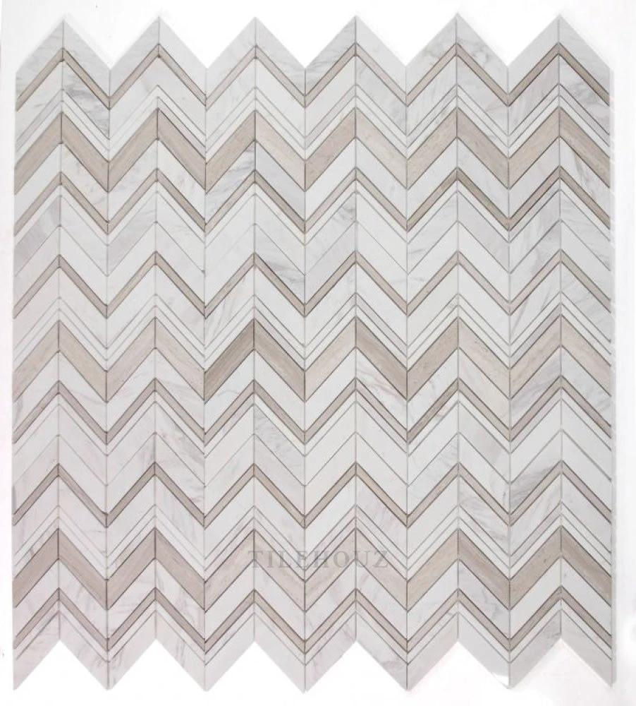 Chevron Ravenna Loft marble wall tile by Tilehouz; white and beige chevron mosaic with gray veining, 11.75 x 12.25.