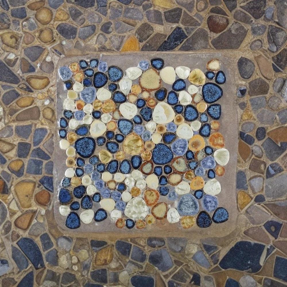 Growing Blue Rust Pebble porcelain mosaic tile by Tilehouz, handmade heart-shaped blue/beige pebble design 11.5x11.5