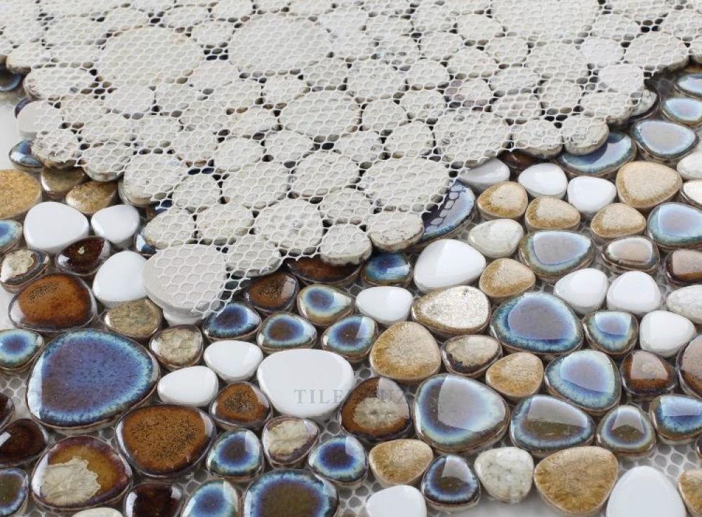 Growing Mango porcelain mosaic tile by Tilehouz, handmade 11.5x11.5 with beige circular discs on mesh