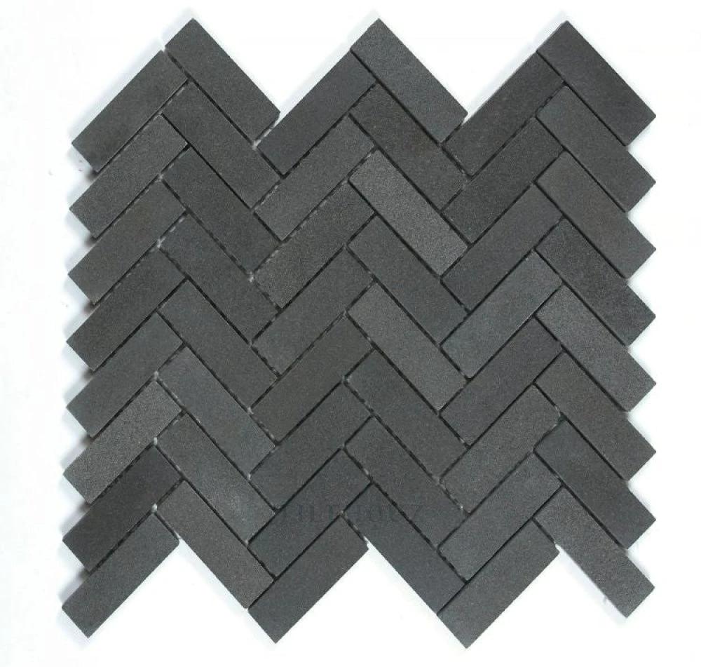 Black basalt 1x3 herringbone mosaic tile sheet for walls/backsplashes, textured dark stone pattern matte finish