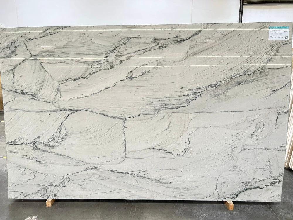 Quartzite Florida Wave polished slab 128x80 by Tilehouz; white with dark gray veining.