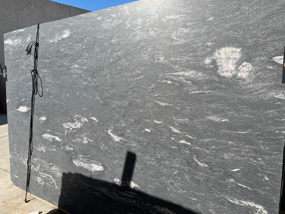 Granite slab Tilehouz Black Cosmic Leather, 121 x 78, dark gray with white veins.