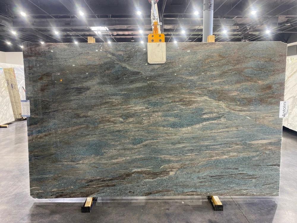 Quarzite Caribbean polished slab countertop; blue-gray with beige veining, 3/4 in thick, Antolini label visible