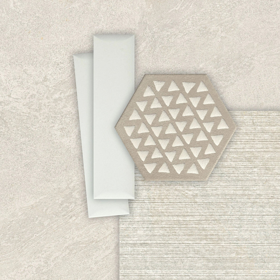 Terracreta hexagon porcelain tile Argilla 8.5x10 with white triangular pattern