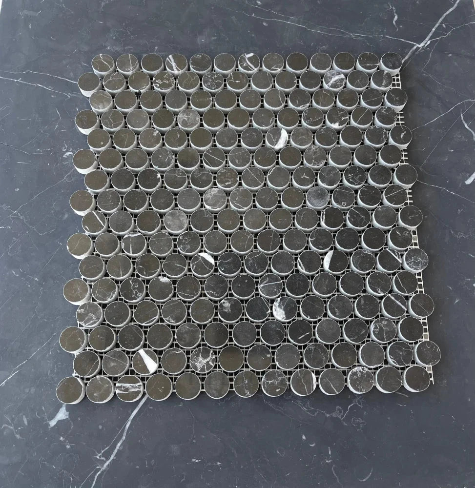 Nero Marquina marble penny-round mosaic tile, black with white veining, polished/honed finish, mesh-backed