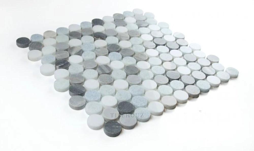 Penny Marble Deep Ocean penny mosaic marble tiles by Tilehouz; round gray-blue discs (11 x 11.75) for walls