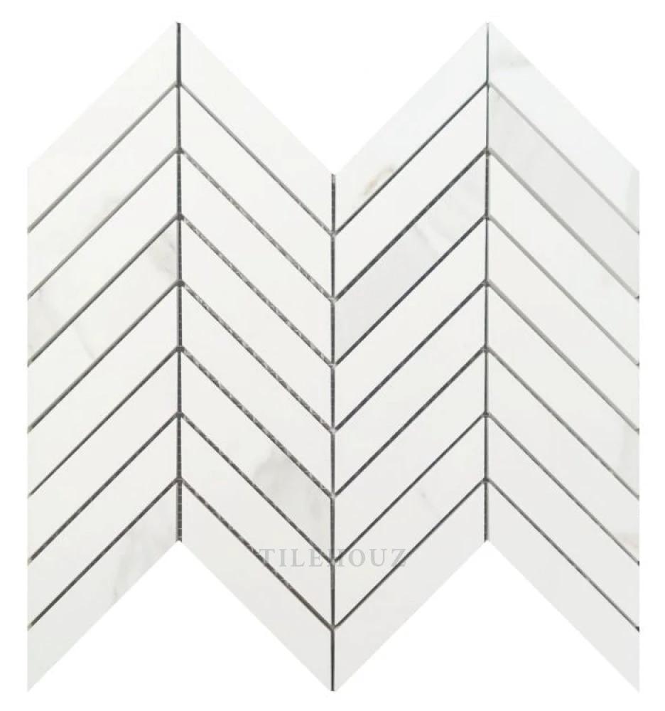 Prestigio Calacatta Soft chevron porcelain tile by Tilehouz, 10x12, white with grey veining.