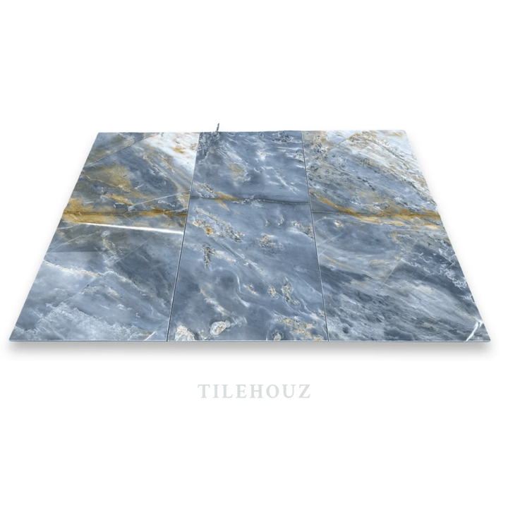 Three Royal Blue Marble 12x24 Tiles by Tilehouz; blue-grey marble with white and gold veining, polished &amp; honed