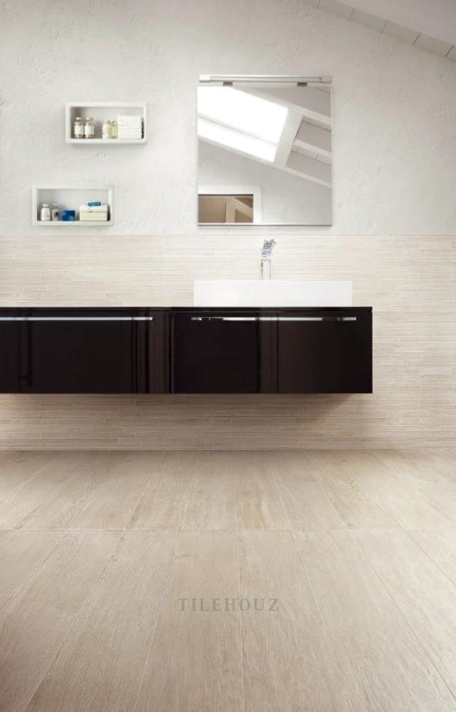 Selection Oak White 8x48 porcelain tile by Tilehouz; light wood-look bathroom floor and wall tiles