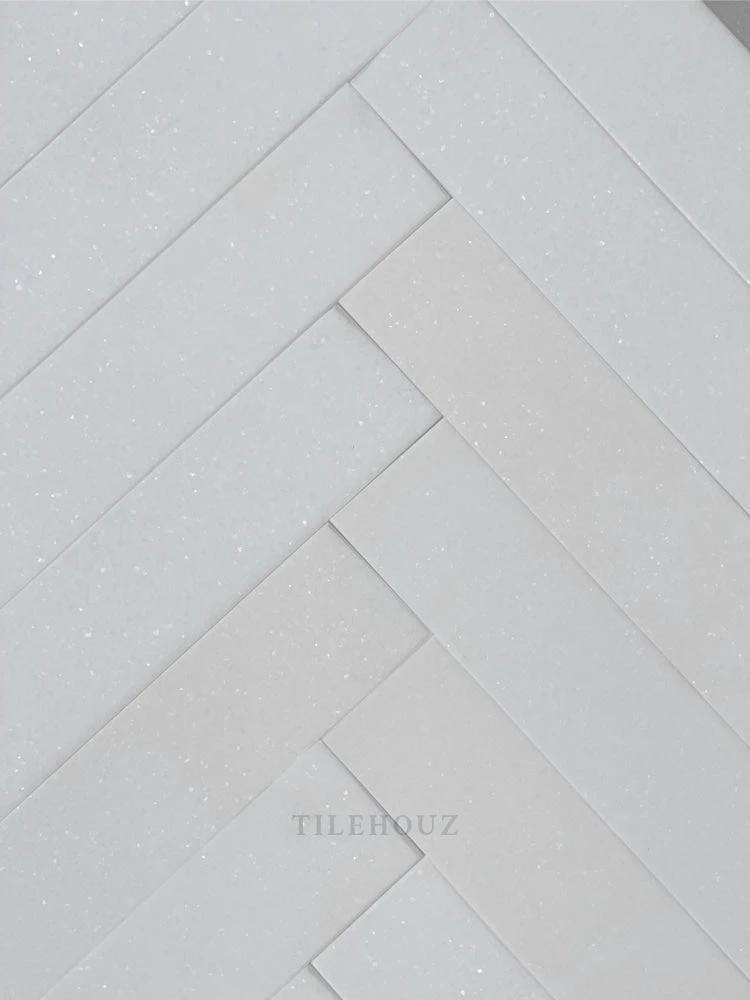 Thassos white marble 2x8 wall tile by Tilehouz, polished and honed finishes