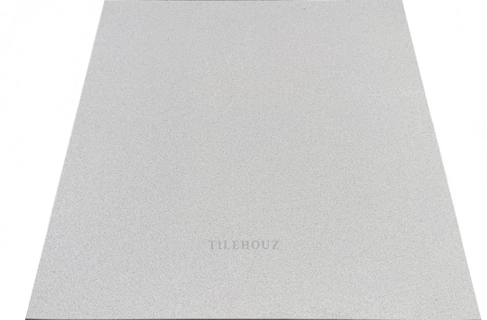 Arcadia 24x24 polished quartz tile by Tilehouz, light gray speckled wall and ceiling tile.